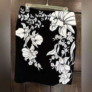 White House Black Market Black Skirt with White Floral Embroidered accents